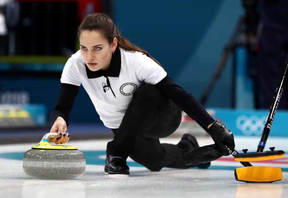 Russia’s Anastasia Bryzgalova competes in curling mixed-doubles on the opening day of the Olympics. (Getty)