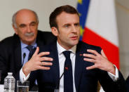French President Emmanuel Macron gestures as he speaks during a debate with intellectuals at the Elysee Palace in Paris, France March 18, 2019. Michel Euler/Pool via Reuters
