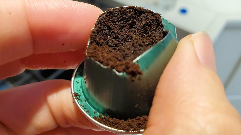 An open coffee pod