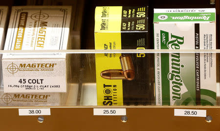 Boxes containing ammunition of different types are seen at Wyss Waffen gun shop in the town of Burgdorf, Switzerland August 10, 2016. REUTERS/Arnd Wiegmann