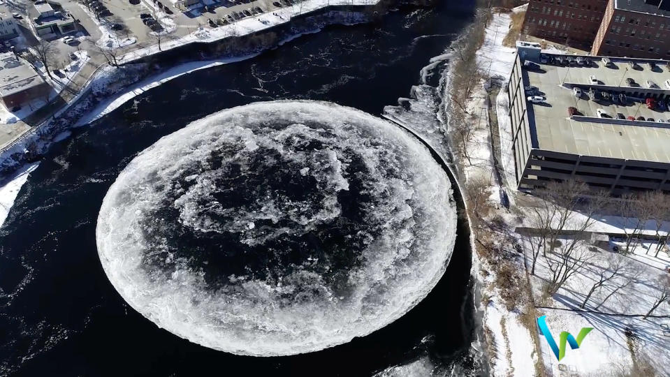 Massive ice disc formed on surface of Presumpscot River is seen in Westbrook, Maine