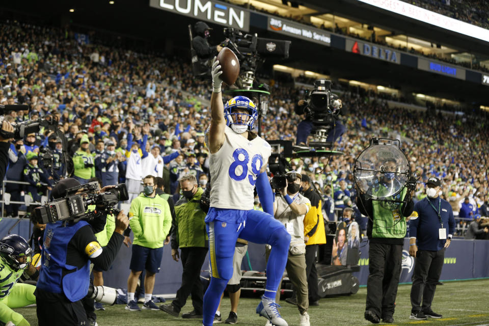 Los Angeles Rams tight end Tyler Higbee (89) celebrates after scoring a touchdown against the Seattle Seahawks during the second half of an NFL football game, Thursday, Oct. 7, 2021, in Seattle. (AP Photo/Craig Mitchelldyer)