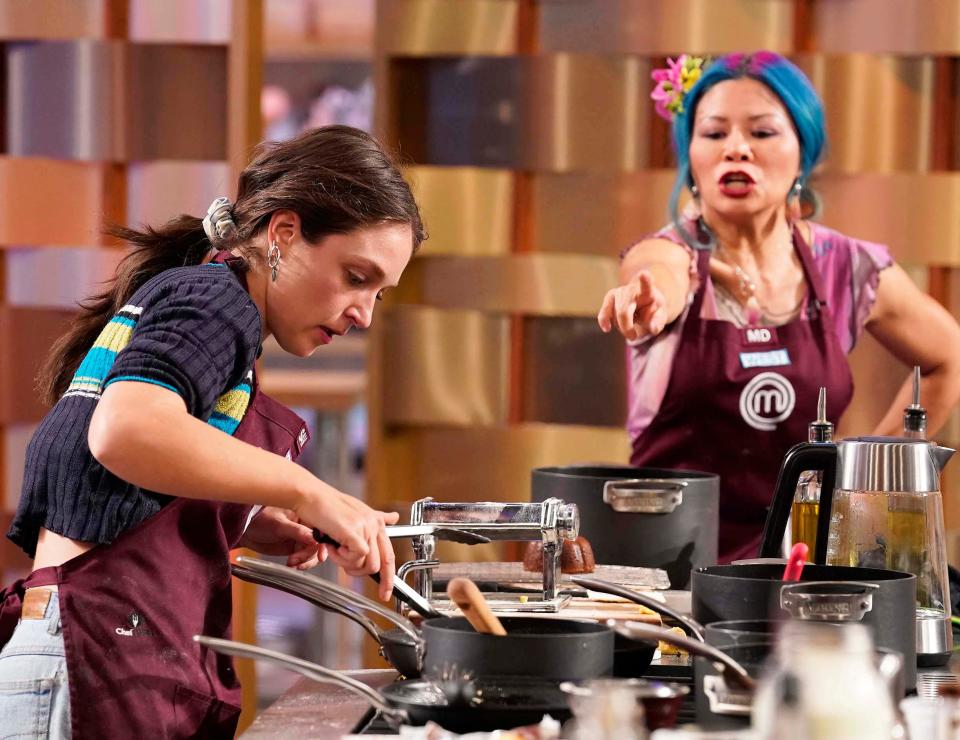 Savannah Miles cooks as teammate Madam Donut, known as MD, gives instructions during the "Tag Team" episode of Fox's "MasterChef" that aired Aug. 23, 2023. Miles and MD turned in the episode's top dish and received immunity in the next challenge in the competition between home cooks for a $250,000 top prize. 