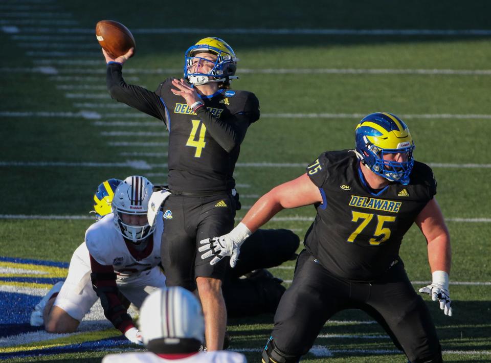 Delaware quarterback Nick Minicucci throws a touchdown in the second quarter against Lafayette in the opening round of the NCAA FCS playoffs Saturday, Nov. 25, 2023 at Delaware Stadium.