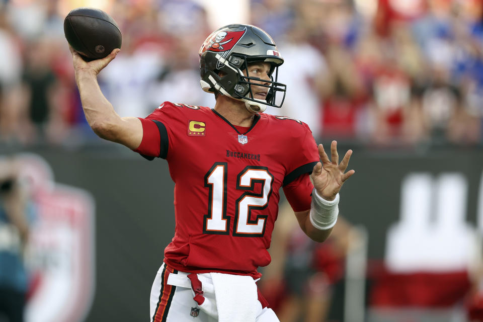 Tampa Bay Buccaneers quarterback Tom Brady (12) throws a pass during the first half of an NFL football game against the Buffalo Bills Sunday, Dec. 12, 2021, in Tampa, Fla. (AP Photo/Mark LoMoglio)