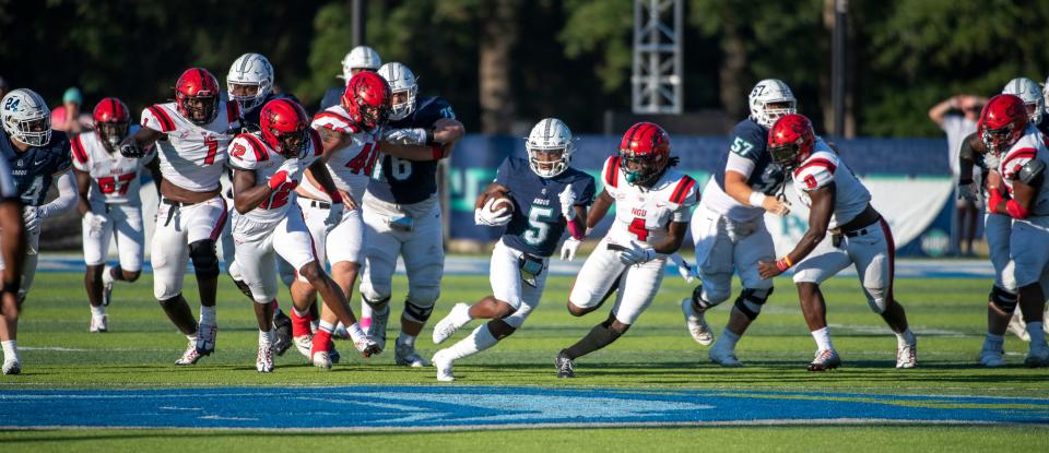 West Florida's Shomari Mason runs down field as they take on North Greenville at Pen Air Field at the University of West Florida Saturday,, October 1, 2022.