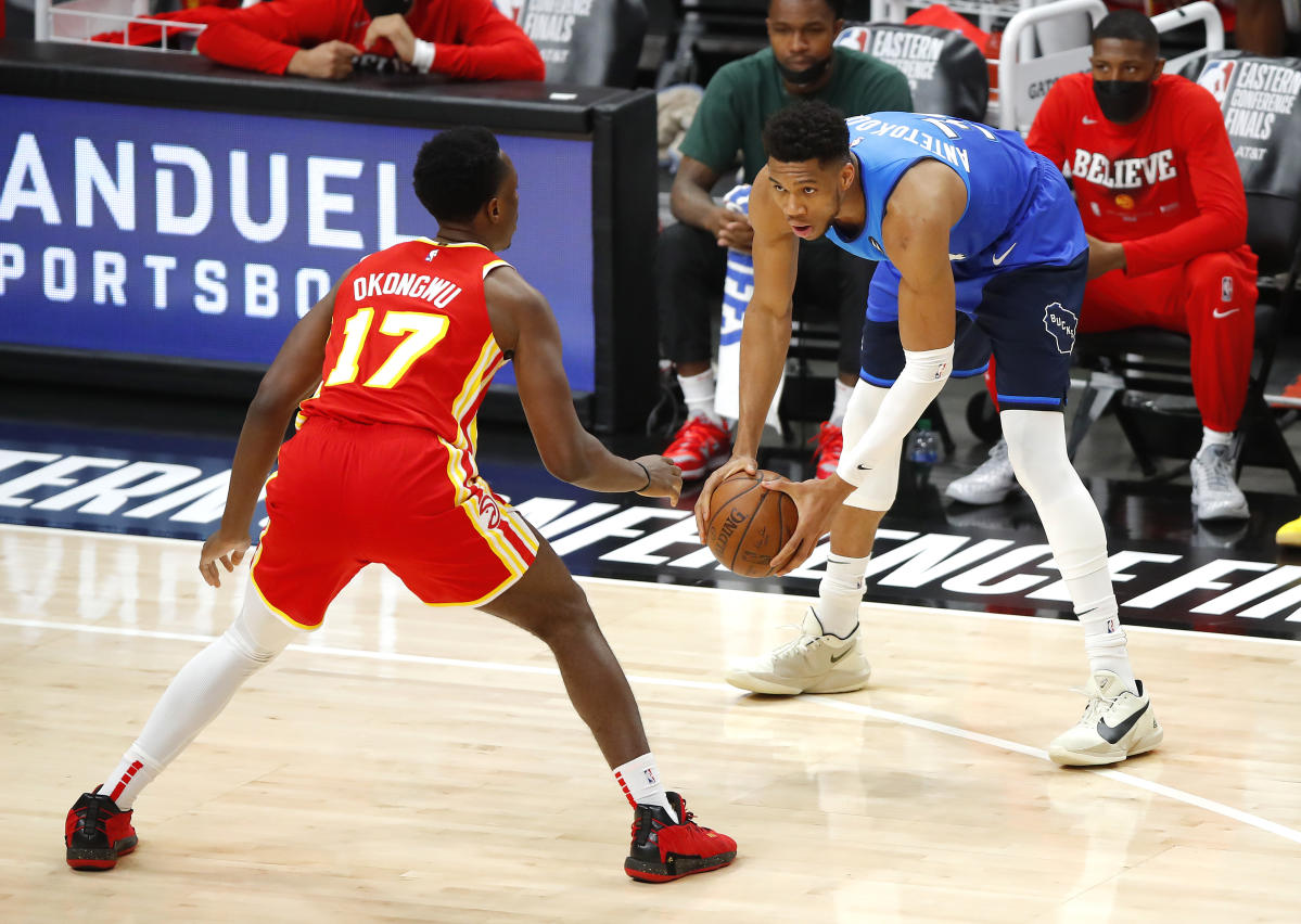 Trae Young: Atlanta Hawks guard to undergo MRI on ankle injury suffered in  Game 3 against Milwaukee Bucks, NBA News