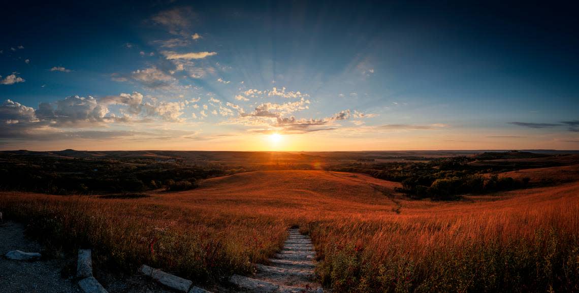 A setting sun can be seen from atop a hill at the Konza Prairie near Manhattan.