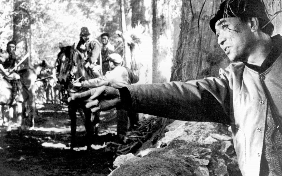 Akira Kurosawa, one-time director of Tora! Tora! Tora!, on the set of The Seven Samurai in 1954 - Reuters