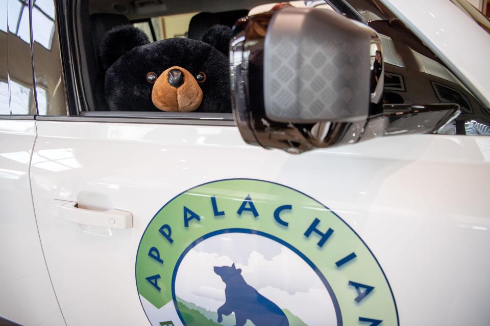 Plush black bears adorn the Land Rover Defender 130 SUV awarded to Appalachian Bear Rescue as part of Land Rover USA's Defender Service Awards during an event at Land Rover Knoxville on Tuesday, Feb. 21, 2023. 