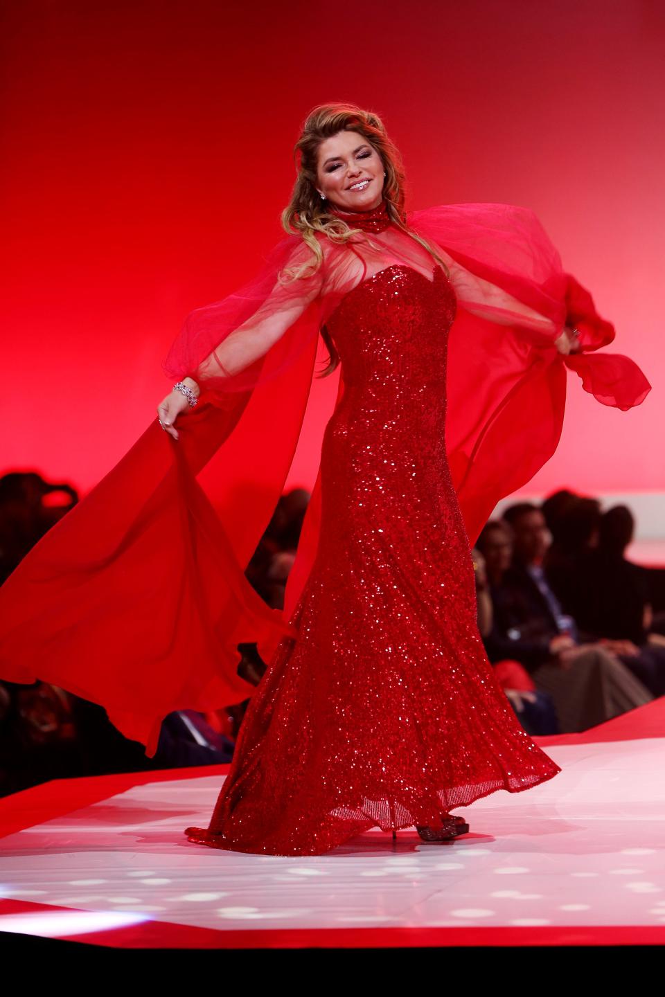 <span><span>Shania Twain at the AHA's Go Red for Women annual Red Dress Collection in 2020.</span><span>atrick Lewis/Starpix/Shutterstock</span></span>