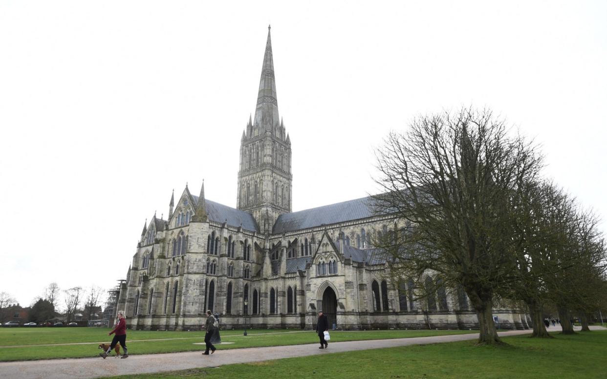 Heated cushions could soon be used to keep congregations warm in draughty, ancient churches such as Salisbury Cathedral to help the CoE meet its new a zero emissions target by 2045 - EPA