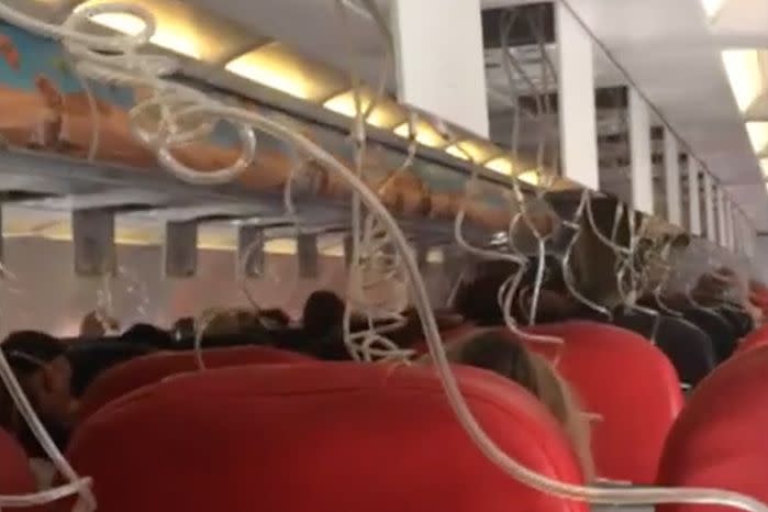 Passengers said their fear escalated by the panicked reactions of staff. Source: 7 News