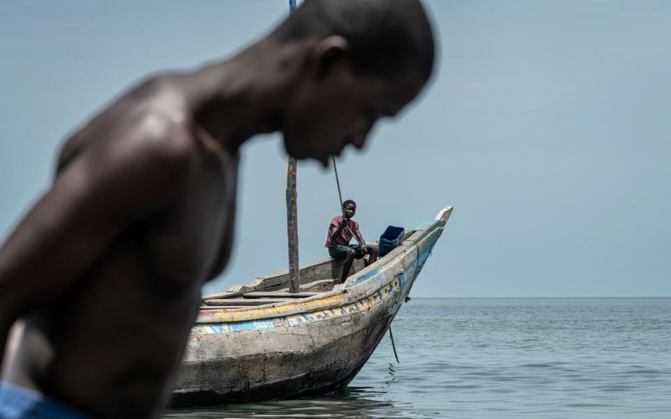 Fishermen landing their catch, Tombo Port, Sierra Leone - Simon Townsley/The Telegraph