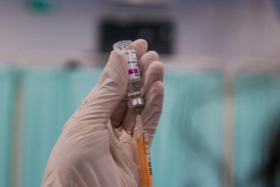 A member of NHS staff prepares the Oxford-AstraZeneca Covid-19 vaccine. The use of the Oxford-AstraZeneca vaccine has been suspended in the Republic of Ireland following reports of blood clotting events in adults in Norway. (Photo by Dinendra Haria / SOPA Images/Sipa USA)