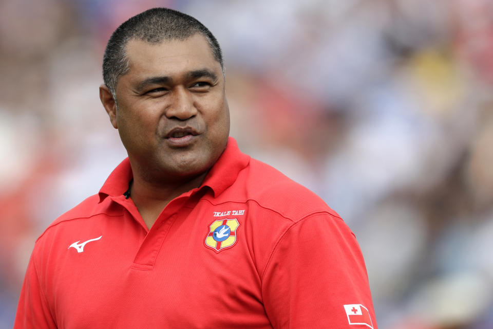 FILE - In this Sept. 28, 2019, file photo, Tonga's coach Toutai Kefu watches his players warm up ahead of the Rugby World Cup Pool C game at Hanazono Rugby Stadium between Tonga and Argentina in Osaka, western Japan. Kefu has been seriously injured and three other members of his family received knife wounds during an alleged break-in at his home in Brisbane's south Monday, Aug. 16, 2021. (AP Photo/Aaron Favila, File)