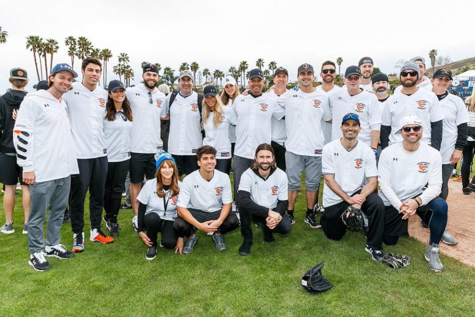 Celebrity players, including Yelich (second from the left), posing for a team photo at last year's 