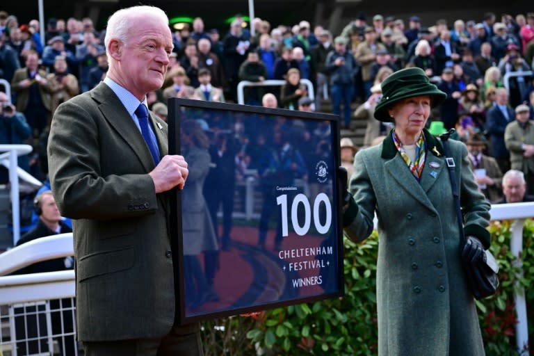 Britain's Princess Anne, presents Mullins with a momento to mark his 100 Festival winners (Ben Stansall)