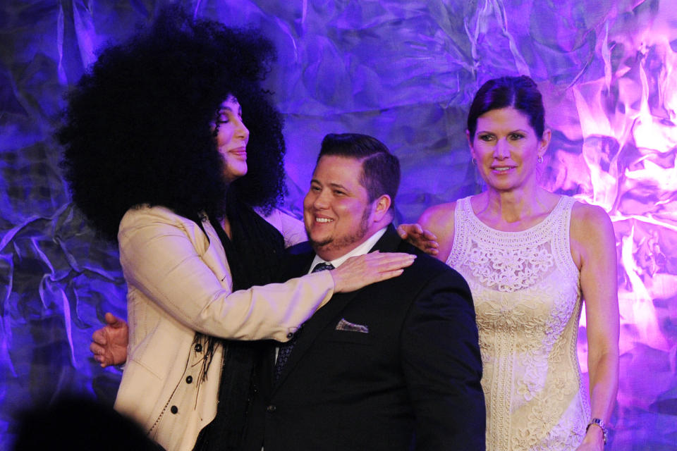 Cher greets her transgender child Chaz Bono (C) as stepmother Mary Bono Mack watches at The 23rd Annual GLAAD Media Awards on April 21, 2012 in Los Angeles, CA. (AP Photo/Vince Bucci)