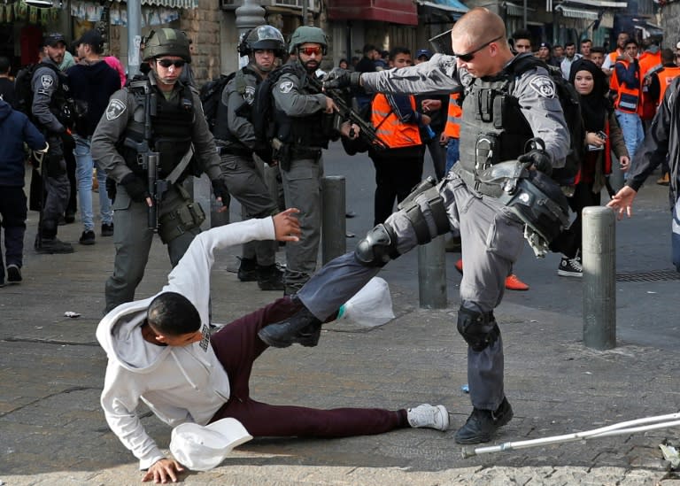 Israeli security forces scuffle with Palestinian protestors outside Jerusalem's Old City on December 15, 2017