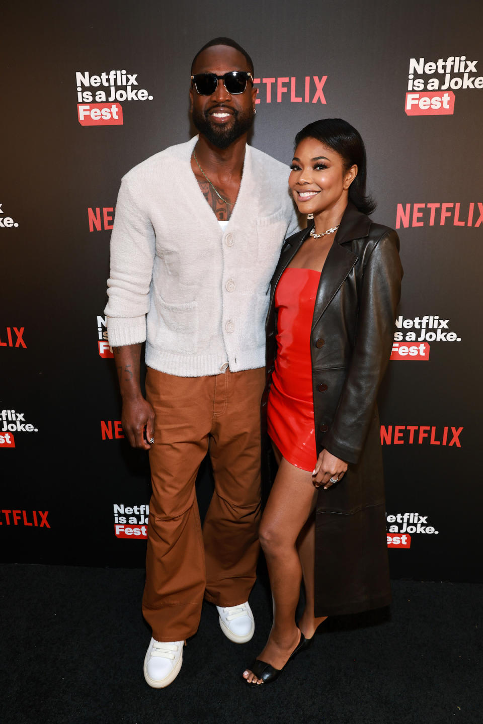 Gabrielle Union showed off her toes in an elevated black sandal for Netflix is a Joke fest while supporting her husband Dwyane Wade.