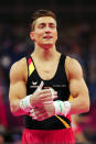 Philipp Boy of Germany smiles before he competes in the horizontal bars in the Artistic Gymnastics Men's Team qualification on Day 1 of the London 2012 Olympic Games at North Greenwich Arena on July 28, 2012 in London, England. (Getty Images)