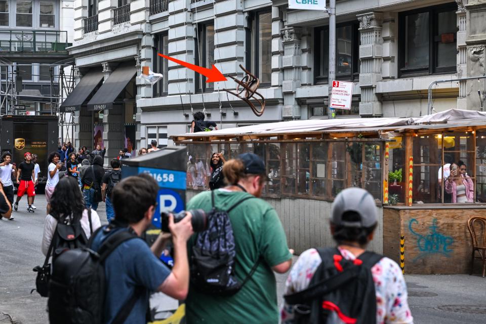 Fans attend Kai Cenat's giveaway in New York City's Union Square Park on August 4, 2023.