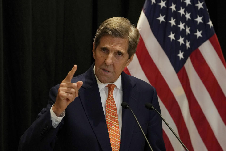 U.S. climate envoy John Kerry gestures as he speaks during a press conference following a two days meeting with Chinese officials, at a hotel in Beijing, Wednesday, July 19, 2023. China is willing to work with Washington on reducing global warming as long as its political demands are met, the country's vice president told Kerry on Wednesday. (AP Photo/Andy Wong)