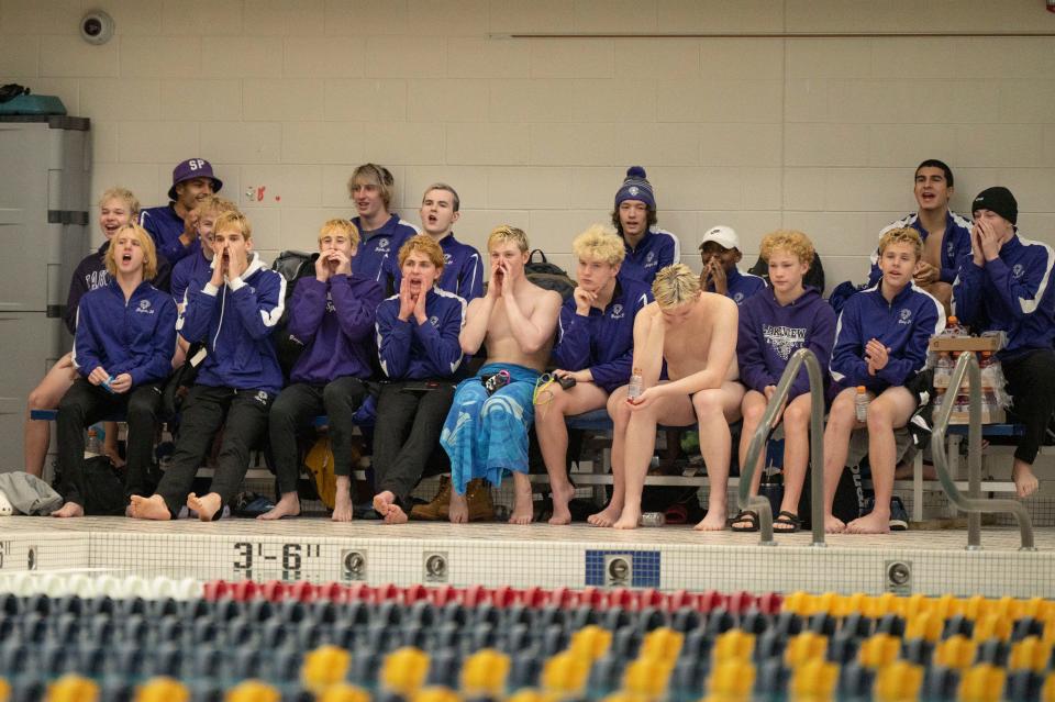 Lakeview swimmers cheer on their teammates in the diving events during the All-City swim meet at Lakeview High School on Saturday, Jan. 14, 2023.