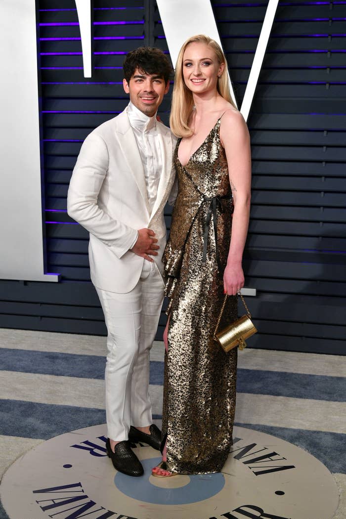 Close-up of Joe and Sophie smiling at a press event