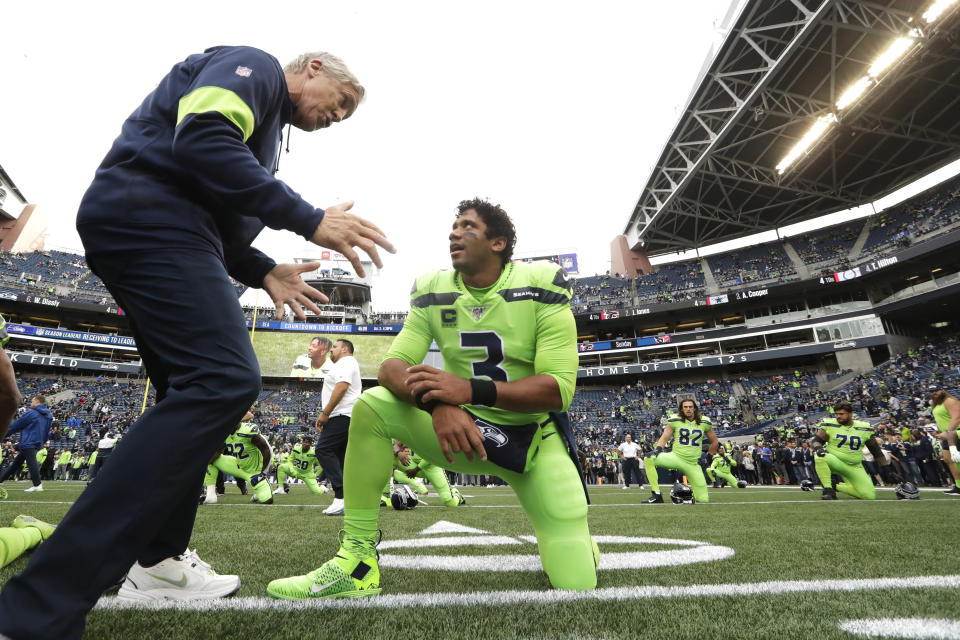 Seattle Seahawks coach Pete Carroll, left, and quarterback Russell Wilson have been a great duo. (AP Photo/Elaine Thompson)