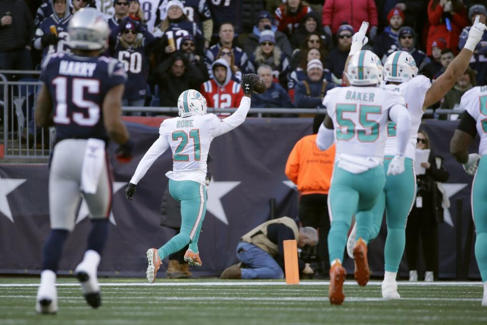 Miami Dolphins cornerback Eric Rowe (21) had a pick-six against his former team on Sunday (AP/Elise Amendola)