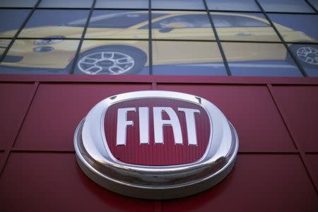 The Fiat logo is pictured at a car dealership at Motor Village in Los Angeles, California October 13, 2014. REUTERS/Mario Anzuoni