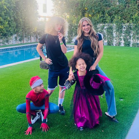 <p>Allison Holker/Instagram</p> Allison Holker poses with her three kids Zaia, Maddox and Weslie on Halloween