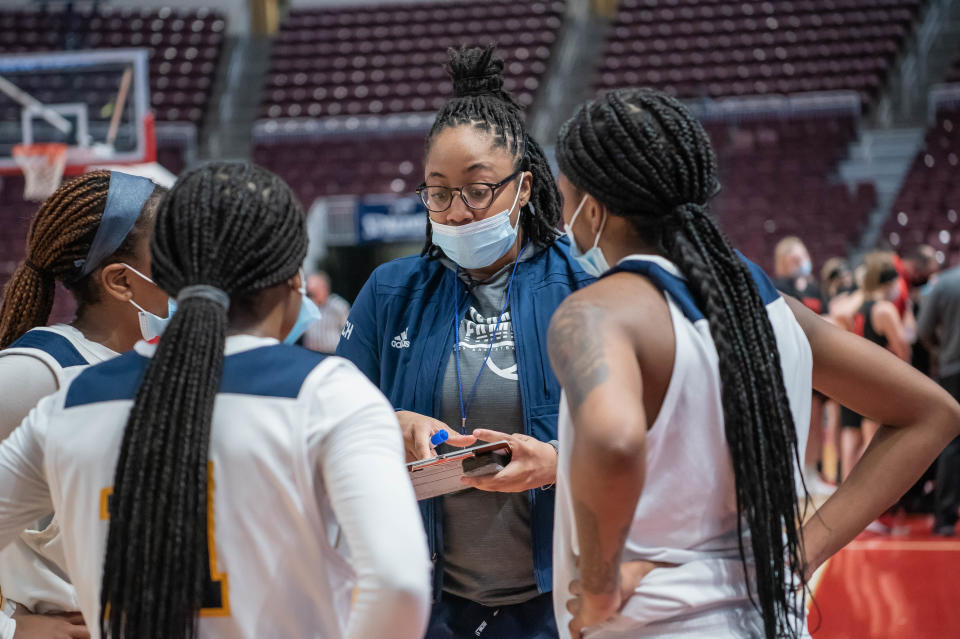 Beulah Osueke coaches during the state championship game. She wants to broaden her reach and help coaches around the city better mentor their players. (Photo provided by Krystal Williams)