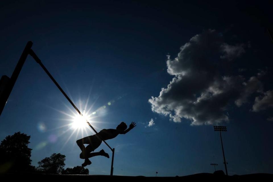 Competitors take flight in the high jump during Tuesday’s Class 3A, Region 6 meet at Lafayette High School in Lexington.