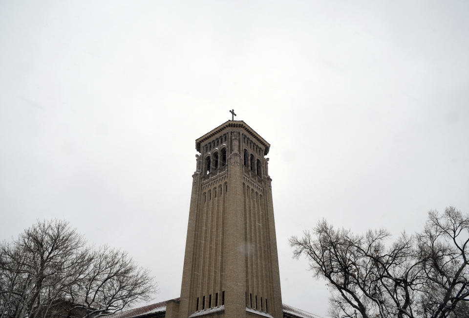 A church tower stands at the Archdiocese of Denver campus on Wednesday, Jan. 18, 2023. The archdiocese is being sued by a man who alleges about 100 instances of abuse at St. Elizabeth Ann Seton Church in Fort Collins, Colo., from 1998 to 2003. The lawsuit is allowed under a 2021 state law that opened up a three-year window for people to pursue litigation for sexual abuse that happened to them as children dating as far back as 1960. (AP Photo/Thomas Peipert)