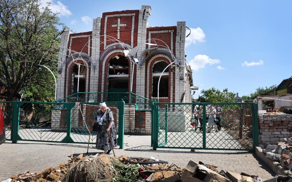 Worshippers leave Sunday service at Sukovska Baptist church on June 19, 2022 in Druzhkivka, Ukraine.  - Photo by Scott Olson/Getty Images