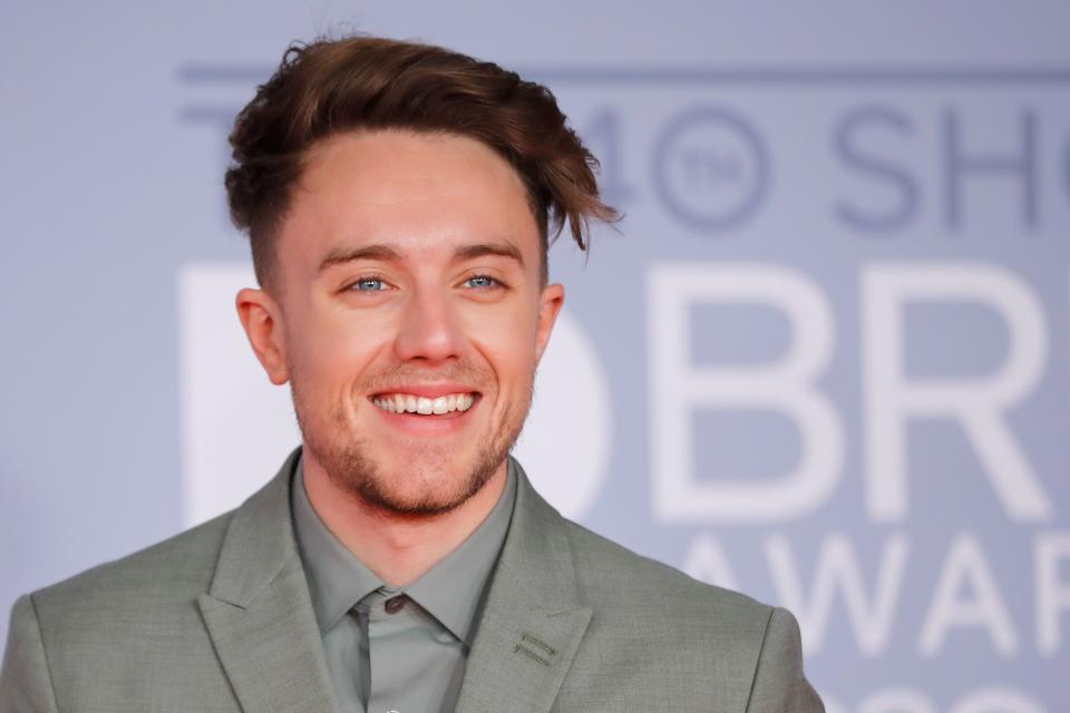 US-born radio presenter Roman Kemp poses on the red carpet on arrival for the BRIT Awards 2020 in London on February 18, 2020. (Photo by Tolga AKMEN / AFP) / RESTRICTED TO EDITORIAL USE  NO POSTERS  NO MERCHANDISE NO USE IN PUBLICATIONS DEVOTED TO ARTISTS (Photo by TOLGA AKMEN/AFP via Getty Images)