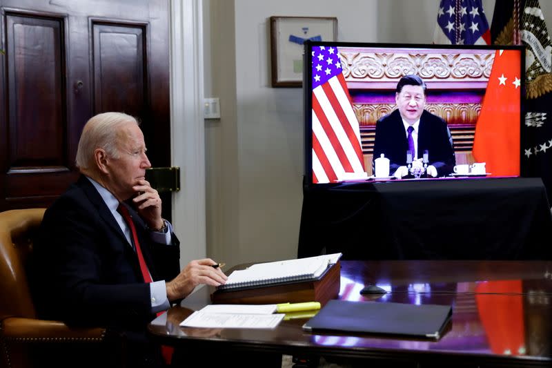 FILE PHOTO: U.S. President Biden speaks virtually with Chinese leader Xi from the White House in Washington