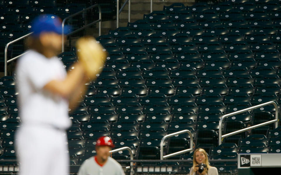 Empty seats are seen as Robert Gsellman #65 of the New York Mets prepares to throw his first pitch of a game against the Philadelphia Phillies at Citi Field on September 6, 2017 in the Flushing neighborhood of the Queens borough of New York City. (Photo by Jim McIsaac/Getty Images)