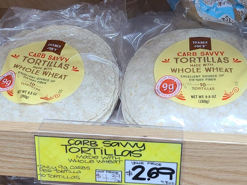 packages of low carb tortillas on the shelves at trader joes