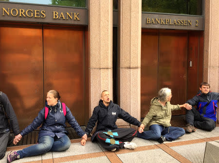 Extinction Rebellion climate activists block Norway's Central Bank entrance in Oslo, Norway May 24, 2019. REUTERS/Nerijus Adomaitis