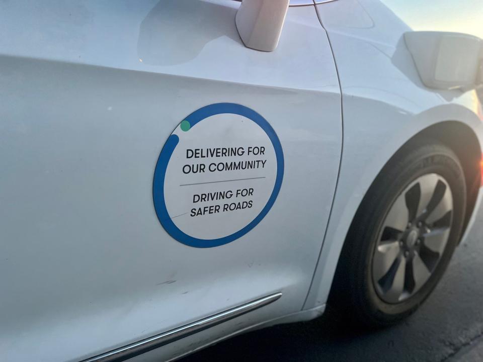 The outside of the Waymo car.