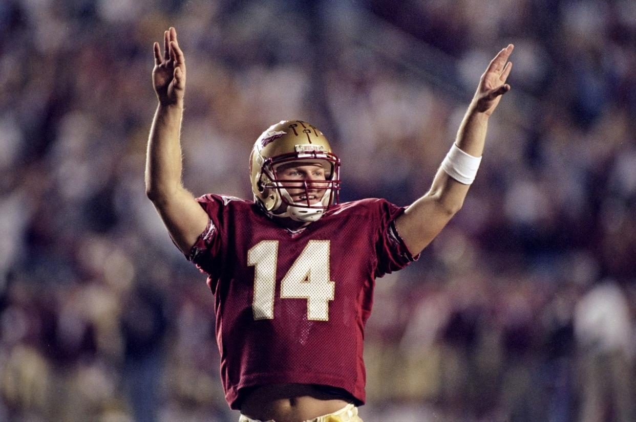 7 Nov 1998: Marcus Outzen #14 of the Florida State Seminoles celebrates during the game against the Virginia Cavaliers at the Doak Campell Stadium in Tallahassee, Florida. The Seminoles defeated the Cavaliers 45-14. Mandatory Credit: Scott Halleran  /Allsport