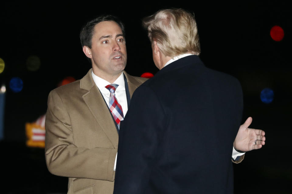 FILE - President Donald Trump greets Ohio Secretary of State Frank LaRose, Jan. 9, 2020, as he arrives at Toledo Express Airport, in Swanton, Ohio. The Republican secretaries of state in Ohio, West Virginia and Missouri all have promoted their states’ elections as fair and secure. Yet each also is navigating a fine line on how to address election fraud conspiracies, as they eye campaigns for U.S. Senate or governor in 2024. (AP Photo/ Jacquelyn Martin, File)