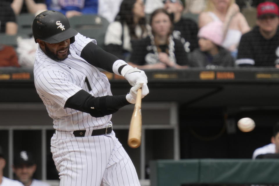 Chicago White Sox's Elvis Andrus hits a single during the fifth inning of a baseball game against the San Francisco Giants in Chicago, Wednesday, April 5, 2023. It was Andrus' 2,000th career hit. (AP Photo/Nam Y. Huh)