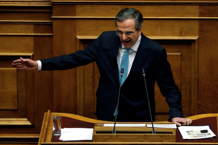 Former Greek Prime Minister Antonis Samaras addresses lawmakers during a parliamentary session before a vote on setting up a special committee which will probe the role of ten politicians in a case which involves alleged bribery by Swiss drugmaker Novartis, in Athens, Greece, February 21, 2018. REUTERS/Alkis Konstantinidis