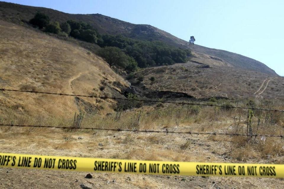Yellow tape cordons off the area where San Luis Obispo County Sheriff’s Office and FBI personnel dug in September 2016 in a search for clues in the 1996 disappearance of Cal Poly freshman Kristin Smart. The search focused on a campus hillside.