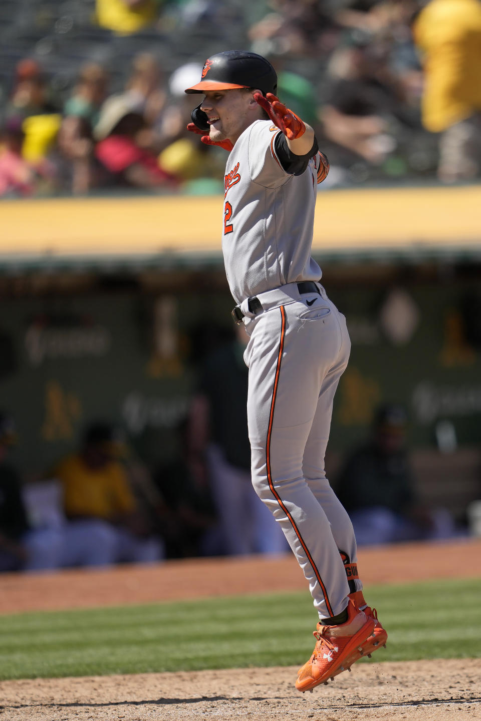 Baltimore Orioles' Gunnar Henderson celebrates after hitting a home run during the seventh inning of a baseball game against the Oakland Athletics in Oakland, Calif., Sunday, Aug. 20, 2023. (AP Photo/Jeff Chiu)